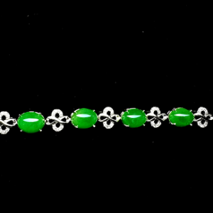 Green Oval Cabochon Bracelet with Ornate Infinity-Style Links