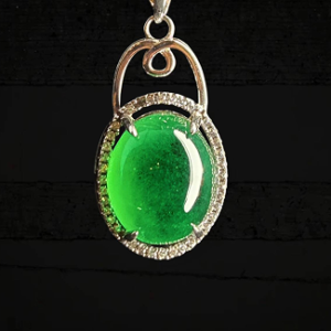 Green Oval Cabochon Pendant with Ornate Silver-Tone Bale
